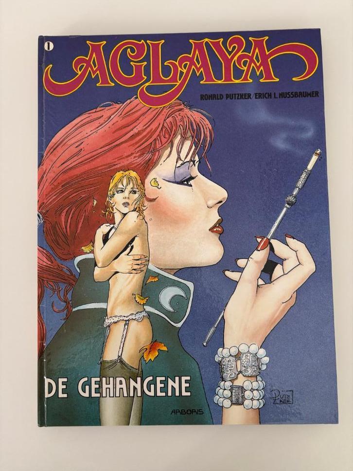 Putzker Aglaya  1 De Gehangene 1e druk 1990, Boeken, Stripverhalen, Gelezen, Eén stripboek, Ophalen of Verzenden