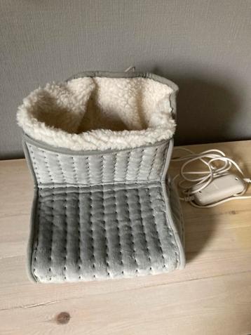 Elektrische voetenverwarmer beschikbaar voor biedingen