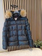 Winterjas Moncler, Ophalen