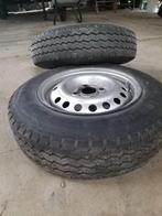 Banden en velgen in goede staat gediend voor aanhanger enkel, Ophalen