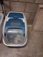 Grote kattenbak, Ophalen