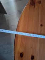 Ronde uittrekbare tafel, Ophalen