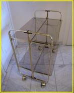 VINTAGE 70' : Bar-roltafel : goudkleurig metaal & fumé glas, Huis en Inrichting, Ophalen, 50 tot 100 cm, Zo goed als nieuw, Glas