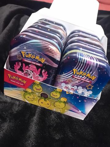 Paldean Fates mystery tins (klein) Pokémon disponible aux enchères