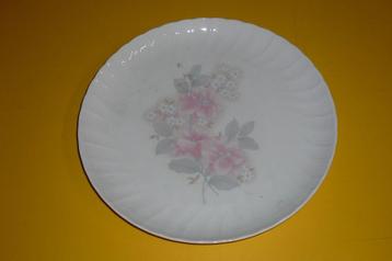 Ronde schotel met bloemen  beschikbaar voor biedingen
