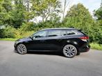 Renault Mégane Grand Tour 13TCE automaat (bj 2023), Auto's, Stof, Gebruikt, 4 cilinders, Zwart