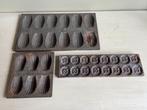 Twee madeleinevormen en een chocoladevorm., Ophalen of Verzenden