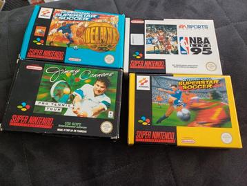 Lot de 4 jeux super Nintendo en boîte 