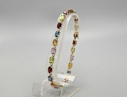 Gouden Vintage tennisarmband met edelstenen. 2025/361, Handtassen en Accessoires, Armbanden, Zo goed als nieuw, Goud, Overige kleuren