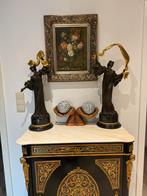 2 bronzen beelden, Ophalen