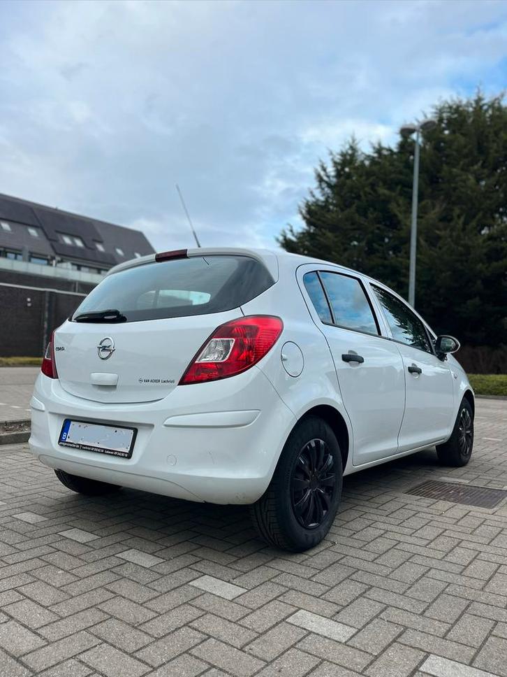 Opel Corsa D 2013, Autos, Opel, Particulier, Corsa, ABS, Essence, Euro 5, 5 portes, Boîte manuelle, Blanc, Carnet d'entretien