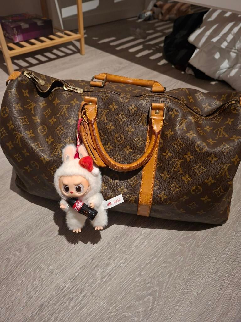 Louis vuitton keepall, Ophalen