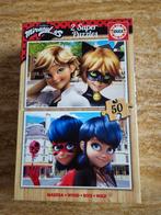 2 puzzels Miraculous, Ophalen, 10 tot 50 stukjes, Zo goed als nieuw, Van hout