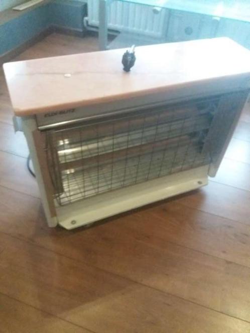 Perfect werkend elektrisch vuurtje NATUURSTEEN op wieltjes, Doe-het-zelf en Bouw, Verwarming en Radiatoren, Zo goed als nieuw