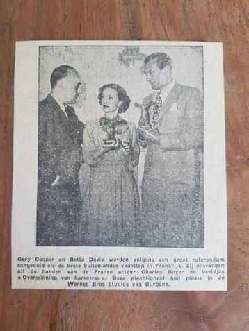 Prijzen voor acteurs Gary Cooper en Bette Davis (krant 1948)