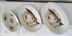 3 porseleinen ovale serveerschalen gedecoreerd met vissen., Huis en Inrichting, Keuken | Servies, Ophalen of Verzenden, Zo goed als nieuw