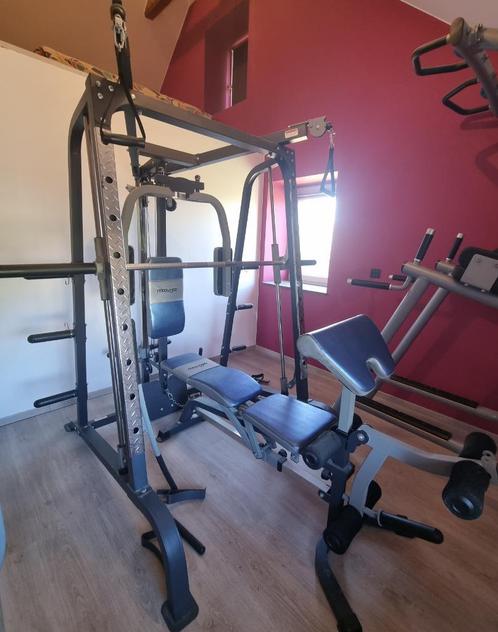 Banc de musculation Moovyoo + divers poids, Sport en Fitness, Fitnessapparatuur, Gebruikt, Ligfiets, Ophalen