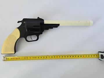 Vintage speelgoed knalkurk pistool "GRG" in plastiek  disponible aux enchères