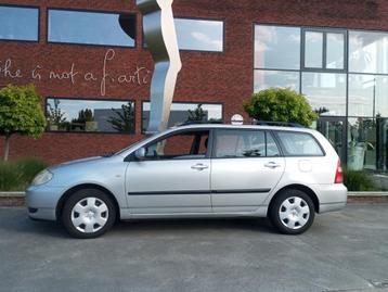 Wagon Toyota Corolla en bon état, essence 1600 cc., Autos, Attache-remorque, Boîte manuelle, Corolla, Break