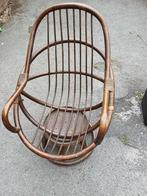 Fauteuil in rotan, Ophalen