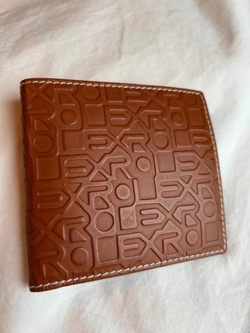 Rolex portefeuille  beschikbaar voor biedingen