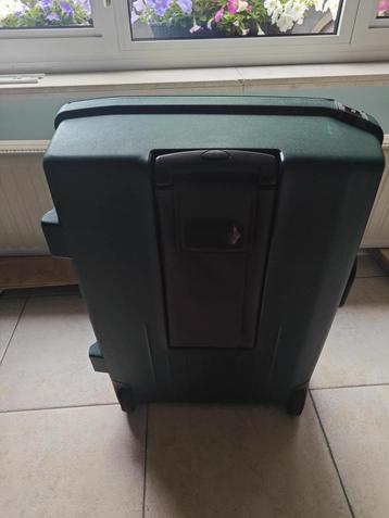 Groene american tourister  koffer met hendel beschikbaar voor biedingen