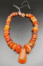 Halsketting van Carneool uit de oudheid, Verzenden