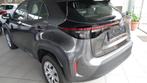 Toyota Yaris Cross DYNAMIC HYBRIDE + GPS (bj 2024), Auto's, Automaat, Stof, Gebruikt, Overige kleuren