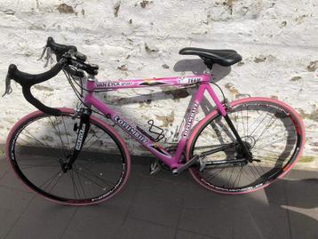 Coursfiets Columbus roze 