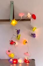 Lichtsnoer van bloemen, Enlèvement