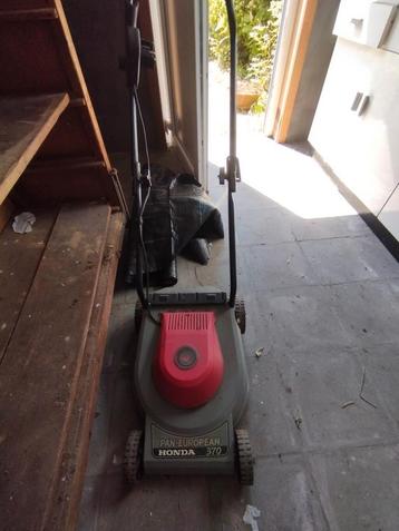 Grasmachine merk Honda, Tuin en Terras, Grasmaaiers, Ophalen, Zo goed als nieuw
