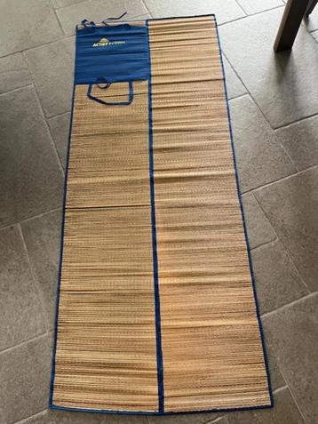 Strandmat beschikbaar voor biedingen