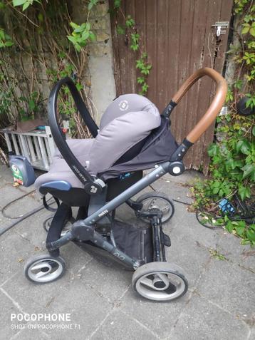 Compacte luxe buggy Mutsy met maxi cosy autostoel beschikbaar voor biedingen