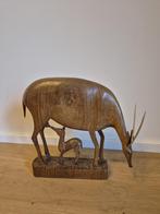 Houten beeld hert met kalf, Ophalen