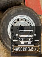 Set banden en stalen velgen Bridgestone dueler H/T 245/70R17, Ophalen, Gebruikt, Banden en Velgen, All Season