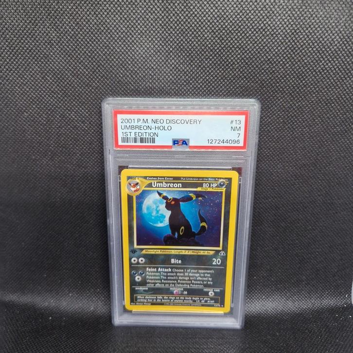 Umbreon Holo 1st Edition Neo Discovery PSA 7, Hobby en Vrije tijd, Verzamelkaartspellen | Pokémon, Ophalen of Verzenden