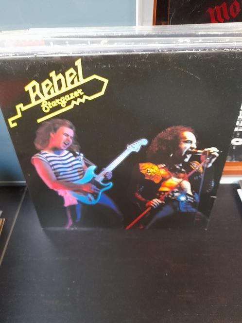 lp - rebel - stargazer - bak 10, Cd's en Dvd's, Vinyl | Hardrock en Metal, Gebruikt, Ophalen of Verzenden
