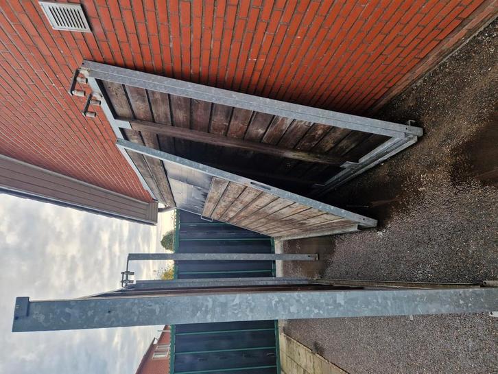 Grote degelijke poort,2.5m hoog en gaat 6m open., Tuin en Terras, Tuinpoorten, Zo goed als nieuw, Schuifpoort, Ophalen