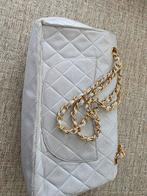 Chanel handtas, Ophalen