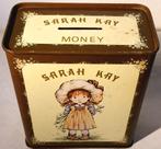 Tirelire vintage Sarah Kay., Enlèvement ou Envoi, Utilisé, Métal ou Fer blanc, Autres thèmes