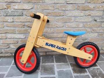 Stoere houten loopfiets beschikbaar voor biedingen
