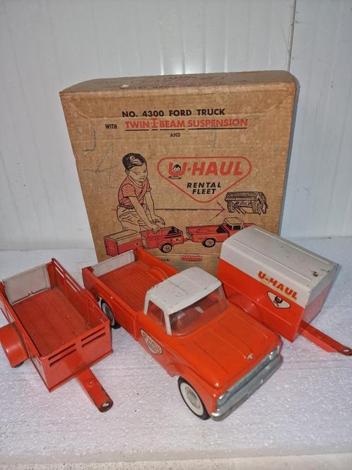 nylint steel toys u-haul ford truck  met trailers, Antiek en Kunst, Antiek | Speelgoed, Ophalen of Verzenden