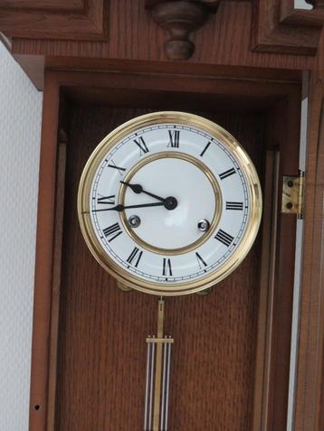 Vintage RA-slingerklok beschikbaar voor biedingen