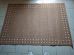Tapis de sol salon, Ophalen