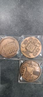 Penningen stad Antwerpen, Ophalen