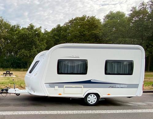 Hobby deluxe 400 Sfe, Caravans en Kamperen, Caravans, Particulier, tot en met 4, 1000 - 1250 kg, Treinzit, Hobby, Frans bed, 4 tot 5 meter