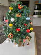 Kleine versierde kunstkerstboom, Ophalen
