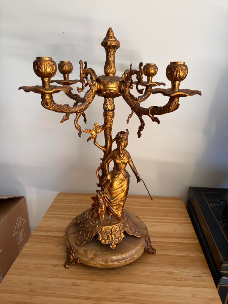 Kandelaar met 4 armen, Ophalen