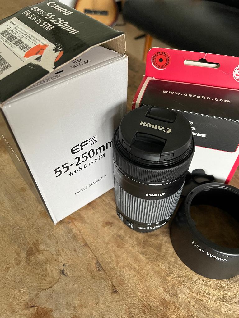 Canon lens EFS 55-250mm + Caruba zonnekap, Ophalen, Zo goed als nieuw, Telelens