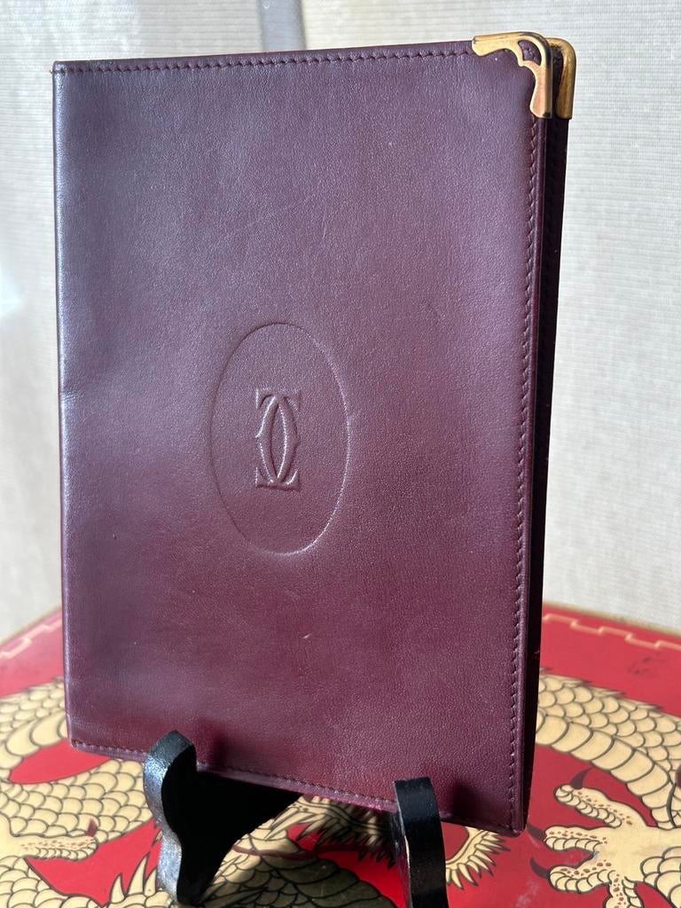 Cartier bordeauxrode leren documentenportemonnee, Handtassen en Accessoires, Portemonnees, Gebruikt, Overige merken, Rood, Leder